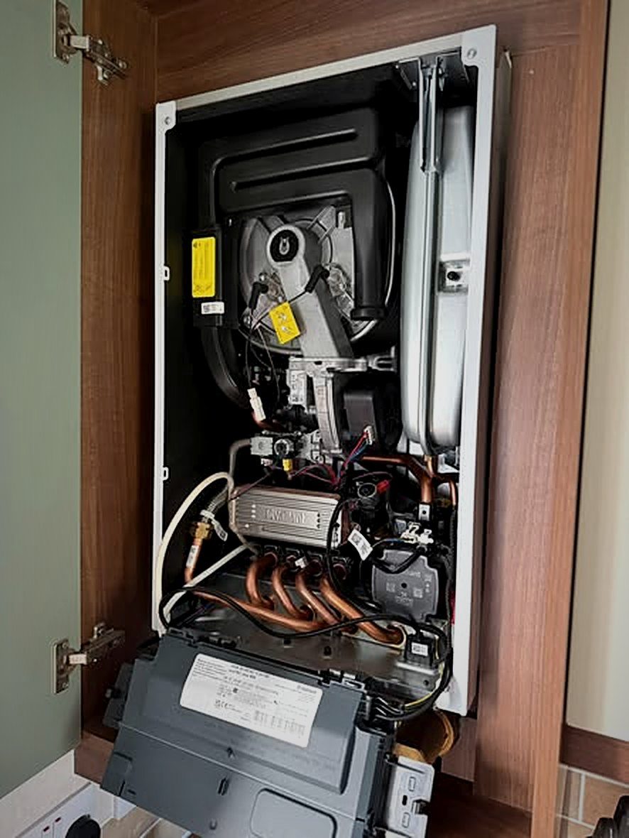 Vaillant ecoTEC plus boiler opened for its first annual service